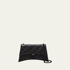 Balenciaga "Crush" wallet in quilted, crinkled calf leather  Tonal sliding chain shoulder strap Can be worn as a wallet/clutch or shoulder bag  Flap top with magnetic closure; hanging B monogram  Approx. 3.9"H x 8.7"W x 1.9"D Wipe clean Made in Italy Black Quilted Wallet On Chain For Evening, Chic Quilted Flap Bag For Evening, Chic Quilted Evening Flap Bag, Quilted Clutch For Evening, Chic Quilted Evening Clutch, Quilted Crossbody Flap Bag For Evening, Evening Quilted Crossbody Flap Bag, Chic Quilted Wallet On Chain For Everyday, Chic Quilted Wallet On Chain