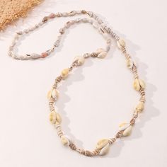 SPECIFICATIONS Fine or Fashion: Fashion Element: Puka Shell Puka Shell Necklace, Puka Shell, Beach Vacations, Memorial Necklace, Sweater Chain, Shell Necklace, Beach Holiday, Shell Necklaces, Conch