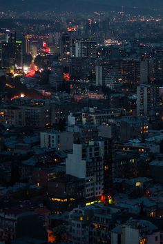 an aerial view of the city at night