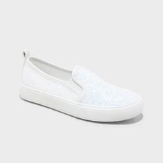 Spruce up their footwear collection with these Carey Slip-On Sneakers from Cat & Jack™. Showcasing allover glitter detailing for an on-trend look, and also feature pull-on tabs which allows for easy on and off. They can pair them with a tee and skinny jeans on a casual day or pair with a dress for a cool look. Cat & Jack™: Classics with an imagination of their own. Construction For Kids, Plastic Heels, Glitter Sneakers, Rubber Shoes, Footwear Collection, White Glitter, Cat & Jack, Slip On Sneakers, Kids Shoes