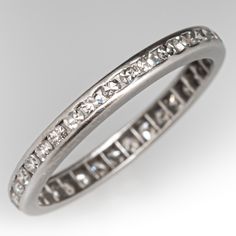 a white gold ring with diamonds on it