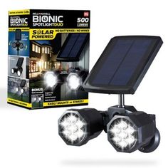 two solar powered spotlights are shown in front of a box with the light on it