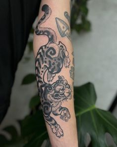 a person with a tattoo on their arm