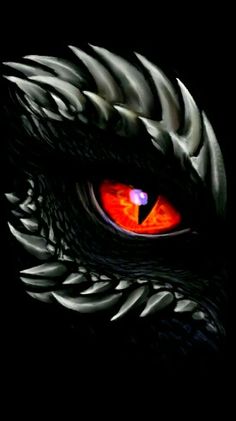 an image of a dragon's eye with red and orange eyes in the dark