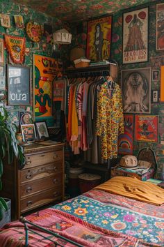 a bedroom with colorful wallpaper and pictures on the walls