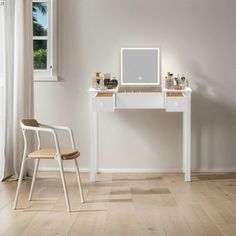 a white desk with a chair and a mirror on it in front of a window