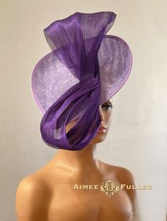 Luscious purple silk ribbon feature on this handsome lavender buckram asymmetrical fascinator.   Easy-to-wear headband fascinator makes a statement, and can be worn to a myriad of events: Easter, Bridal, Derby-Wear, Del Mar Races, Hat Contests, Church, Gala, Kentucky Derby, Melbourne Cup, High Tea, Weddings, Cocktail Parties, Weddings, and More.  Some customization available as this is made-to-order; please message with your requests to see if we can meet your needs. Other colors available; please inquire before purchase if you need another color.   *FREE SHIPPING  For more STATEMENT JEWELRY and HANDMADE HATS go to www.aimeesfuller.com Aimee Fuller has been a trusted online seller since 1999, and is excited to bring her creations back to Etsy.  Though often copied by hobbyists and even hig Elegant Purple Top Hat For Kentucky Derby, Purple Formal Hat For Kentucky Derby, Elegant Purple Top Hat For Royal Ascot, Fitted Purple Hat For Kentucky Derby, Elegant Purple Top Hat For Races, Elegant Purple Top Hat With Curved Brim, Adjustable Purple Headpiece For Formal Events, Purple Hat For Kentucky Derby, Adjustable Purple Headpiece For Evening