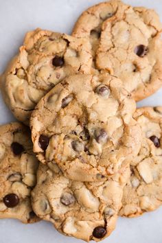 chocolate chip cookies stacked on top of each other