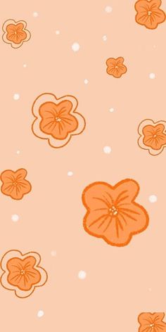 an orange flower on a pink background with white polka dots and small circles in the center