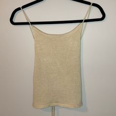 Cute Tan Knit Tank Top With Open Tie Back. Size Medium, Never Worn! Beige Ribbed Knit Crop Top, Beige Knitted Crop Top, Beige Knit Crop Top, Beige Soft Knit Top For Summer, Knit Crop Top For Day Out, Beige Soft Knit Summer Top, Beige Knitted Tops, Cream Soft Knit Summer Tops, Knit Beige Tops For Day Out