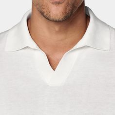 A
 comfortably tailored knit highlighted by a buttonless placket, this off-white
 polo brings all the versatility of the classic piece in a fresh new way. Classic White Polo Shirt With Ribbed Collar, White Elegant Collared Polo Sweater, Elegant White Polo Collar Sweater, Elegant White Polo Sweater, White V-neck Top With Seamless Collar, White Polo Shirt With Ribbed Collar For Work, Elegant White Polo Shirt With Ribbed Collar, Classic Cream Polo Shirt With Collared Neckline, Classic White Collared Polo Shirt