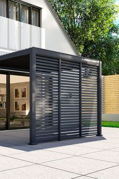 an open garage with sliding doors on the outside