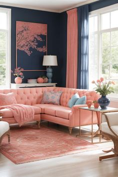 a living room with blue walls and pink furniture