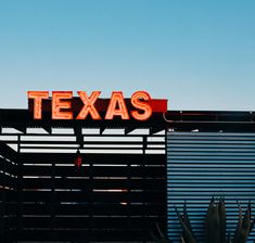 the texas sign is lit up for us to see