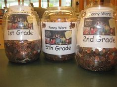 three glass jars filled with different types of coins on a counter top, labeled 1st grade and 2nd grade