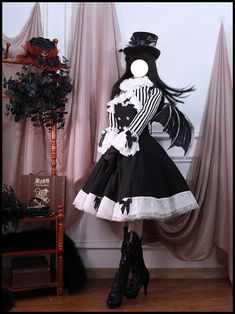 A bolero jacket and sleeveless dress with a black and white striped pattern that makes you look like a clown princess. The jacket is decorated with lace on the cuffs and frills on the hem. The hem of the sleeveless dress is also decorated with lace. Decorating with jabots, brooches, and ribbon clips creates a mysterious yet cute atmosphere.       Item     Bolero jacket   Sleeveless dress   Jabot   Ribbon brooch   Ribbon clip (set of 2)         Size     Bolero jacket     S size     Shoulder width Ribbon Clip, Ribbon Brooch, Bolero Dress, Clothing Design Sketches, A Clown, Dress Design Sketches, Prom Dress Inspiration, Bolero Jacket, Really Cute Outfits