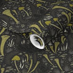 an image of a black and yellow wallpaper with green plants on the side,