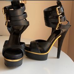 Gucci Gladiator Platform Sandals. Size 36.5 Black Leather, Black Sued, Gold Detailing. Excellent Condition. Gucci Party Heels With Buckle Closure, Gucci Ankle Strap Sandals With Buckle, Gucci Ankle Strap Sandals With Buckle Closure, Modern Gucci Sandals For Evening, Modern Gucci Evening Sandals, Chic Gucci Sandals With Buckle Closure, Gucci Ankle Strap Leather Sandals, Gucci Black Heels With Buckle Closure, Designer Sandals With Buckle Closure For Night Out