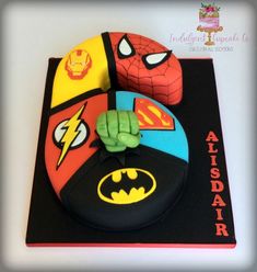 a birthday cake decorated to look like the avengers