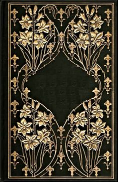 an intricately designed book cover with gold flowers and leaves on black paper, in the style of art deco