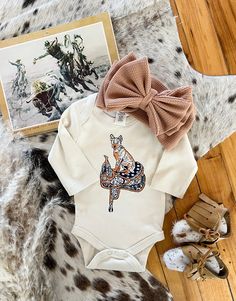 #fringedpineapple #fringedbabe #localbusiness #smallbusiness #cutebusiness #idahoboutique #boutique #cuteboutique #cowboy #cowgirl #countrywear #countryclothes #basics #rodeomom #countrydecor #fringeddesign #heelerlongsleeveonesie #heeleronesie Baby Cowgirl Outfits, Cowgirl Outfits, Cow Girl, Cow Boy, Good Friends