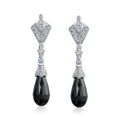 PRICES MAY VARY. BEAUTIFUL DESIGN - Glow radiantly exuding vintage style with a luxe, red carpet feel in these sumptuous sterling silver and cz, long drop earrings. A regal, luxurious black briolette glass bead dangles from an exquisite art deco style cz design. For Pierced Ears, Post with Friction Back, Material: .925 Sterling Silver, Cubic Zirconia, Glass, Measure: 1.75 in L x 0.4 in W, Weight: 9.1 Grams Affordable Alterative to Diamonds-Buy Cubic Zirconia: Show your love for the Earth and you 18th Century Vampire, 1920s Jewelry, Black Drop Earrings, Ornate Jewelry, Vintage Style Earrings, Roaring 20's, Cubic Zirconia Jewelry, Long Drop Earrings, Cz Jewelry