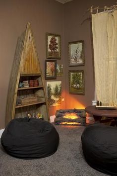 two bean bag chairs sitting in front of a fireplace