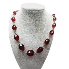 "Vintage Art Deco Red Crystal Necklace (A1079) Size: About 28\" Color: Red Condition: Fair to good vintage; Some of the crystals have imperfections and flea bites. Bead cap plating is not great. Era: Circa 1930s Signed: None Please look at all the photos, as they are part of the description. I try my best to point out any flaws. Also please remember this is a preloved piece and may show signs of light wear, marks, scratches, etc. I will be posting a lot more jewelry, Keep checking back." Red Ruby Bead Necklaces, Red Beaded Ruby Necklace, Red Beaded Ruby Jewelry, Red Ruby Beaded Necklace, Red Ruby Round Beaded Necklace, Red Jewelry With Lobster Clasp For Party, Red Party Jewelry With Lobster Clasp, Red Ruby Beaded Necklaces For Jewelry Making, Red Long Necklace For Formal Occasions