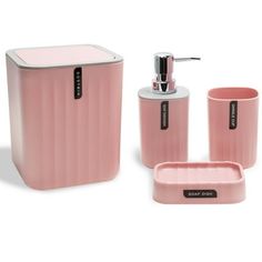 a pink bathroom set with soap dispenser and cups