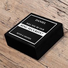 a black and white box that says, daniel will you be your king security?