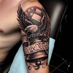 a man with an eagle and flag tattoo on his arm