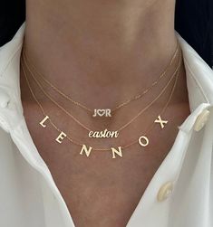 This adorable small all DIAMOND name necklace is the perfect accessory! It looks great alone or layered with other necklaces. UPPERCASE letters only. HEARTS COUNT AS LETTERS! Example shown is 3 letters. WE WILL NOT PROCESS YOUR ORDER IF YOU DO NOT SELECT THE RIGHT AMOUNT OF LETTERS. Available in 14K Yellow Gold or 14K White Gold Height: Approx. 0.18" (very dainty) Stones: diamonds Length: Based on number of letters Price is based on the number of letters in the custom text ALL UPPERCASE LETTERS Vietnam Jewelry, Necklace Name Design, Diamond Name Necklace, Necklace Aesthetic, Necklace Stack, Expensive Jewelry Luxury, Only Hearts, Jewelry Luxury, Expensive Jewelry