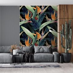 a living room filled with furniture and wallpaper covered in birds of paradise murals