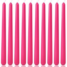 six pink candles lined up in a row