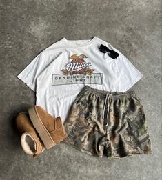 90s Miller Genuine Draft Graphic T Shirt  Outfit inspo  Shirt Outfit Ideas  Top Sellers Easy 30 day return policy Summer Style Hot Weather, Cool Mom Outfits Spring, Comfy Warm Weather Outfits, Camp Shorts Outfit, Fall Hot Weather Outfits, Casual Summer Outfits 2024, Cute Camping Outfits Summer, Boyfriend Shorts Outfit, Thrifted Outfits Summer