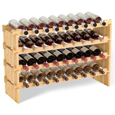 a wooden wine rack filled with lots of bottles