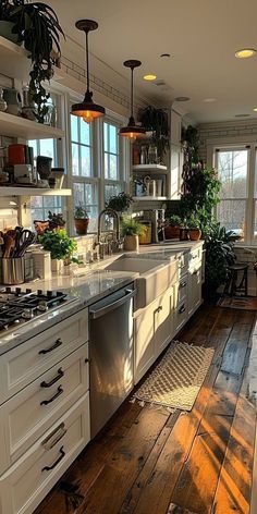 a kitchen filled with lots of counter top space next to a stove top oven and dishwasher