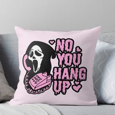 a pink pillow that says no you hang up with a black and white monkey on it