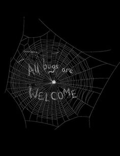 a spider web with the words all dogs are welcome written in white on black background