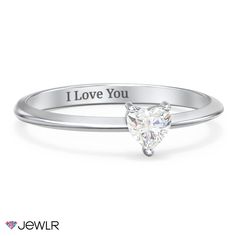 Create the perfect symbol of your commitment and make a romantic gesture she will never forget. This beautiful promise ring features a sparkling heart-shaped gemstone in a modern 3-prong setting on a tapered, knife-edge band. Personalize this ring with a birthstone or favorite gemstone, and add a meaningful engraving to make a one-of-a-kind gift. This ring will be handcrafted in your choice of sterling silver, white, yellow, or rose gold. Womem Promise Rings, Cheap Elegant Engraved Promise Ring, Luxury Timeless Ring For Promise, Cheap White Promise Rings, Classic Luxury Promise Ring, Cute Promise Rings Jewlr, Affordable Romantic Promise Rings, Cheap Diamond Cut Rings For Promise, Cheap Silver Promise Ring