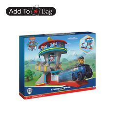 a box with a toy train on the front and an image of a building in the back