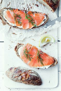 two pieces of bread with salmon on them