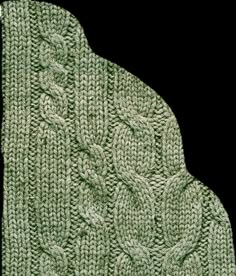 a green knitted scarf with leaves on it