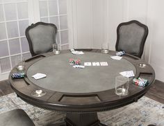 a round table with dice and cards on it