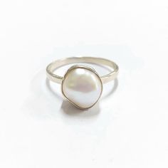 -PRODUCT TYPE - STERLING SILVER PEARL RING -MATERIAL - SILVER -PURITY - 925 -PEARL WEIGHT - 3.40 CARAT -SILVER WEIGHT - 925 - 1.540 GRAMS APPROX -TOTAL WEIGHT - 2.220 GRAMS APPROX 925 SILVER JEWELRY - We are Introducing this new collection of Silver jewelry which is distinctive and unique. We have used natural pearl stone of superb quality. So, here We launch this item on etsy! Minimal & Simple, 925 Sterling Silver Rings. Pearl Understated Luxury. - Delicate Silver ring. - Made to order, jus Pearl White Sterling Silver Ring For Gift, Sterling Silver Pearl Ring With Pearl Drop, Sterling Silver Pearl Drop Ring, Elegant Sterling Silver Pearl Drop Ring, White Sterling Silver Rings With Pearl Drop, Sterling Silver White Gold Pearl Ring, Sterling Silver Rings With Pearl Drop, White Gold Sterling Silver Pearl Ring, Everyday White Gold Pearl Ring In Sterling Silver