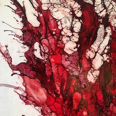 an abstract painting with red and white colors