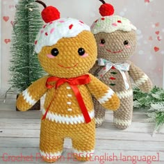 two crocheted teddy bears dressed up in christmas outfits, one wearing a hat and the other holding a candy cane