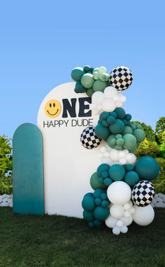 balloons are arranged in the shape of a number one sign