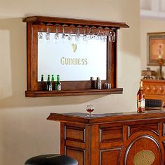 an old fashioned bar with wine glasses on it