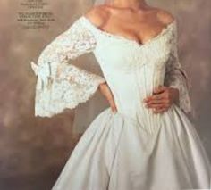 a woman in a white wedding dress and veil posing for a magazine cover with her hands on her hips